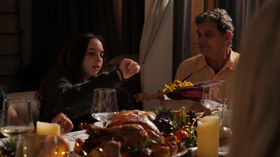 Family sharing a meal at home